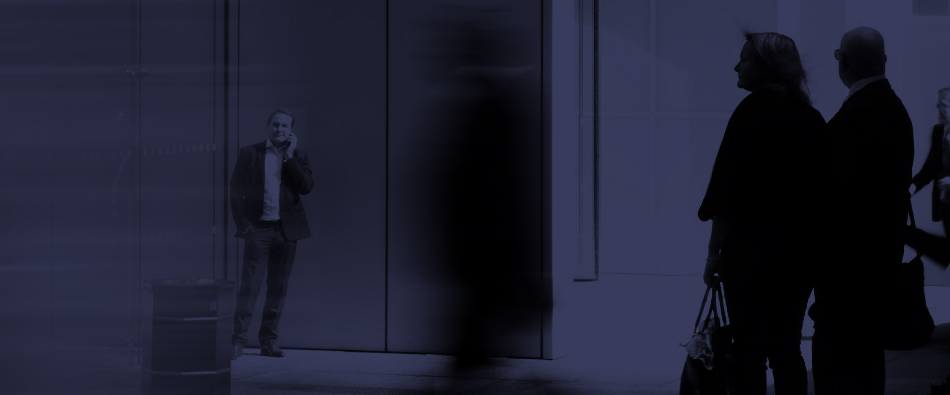 People Walking Towards Building Entrance People Walking Towards Building Entrance